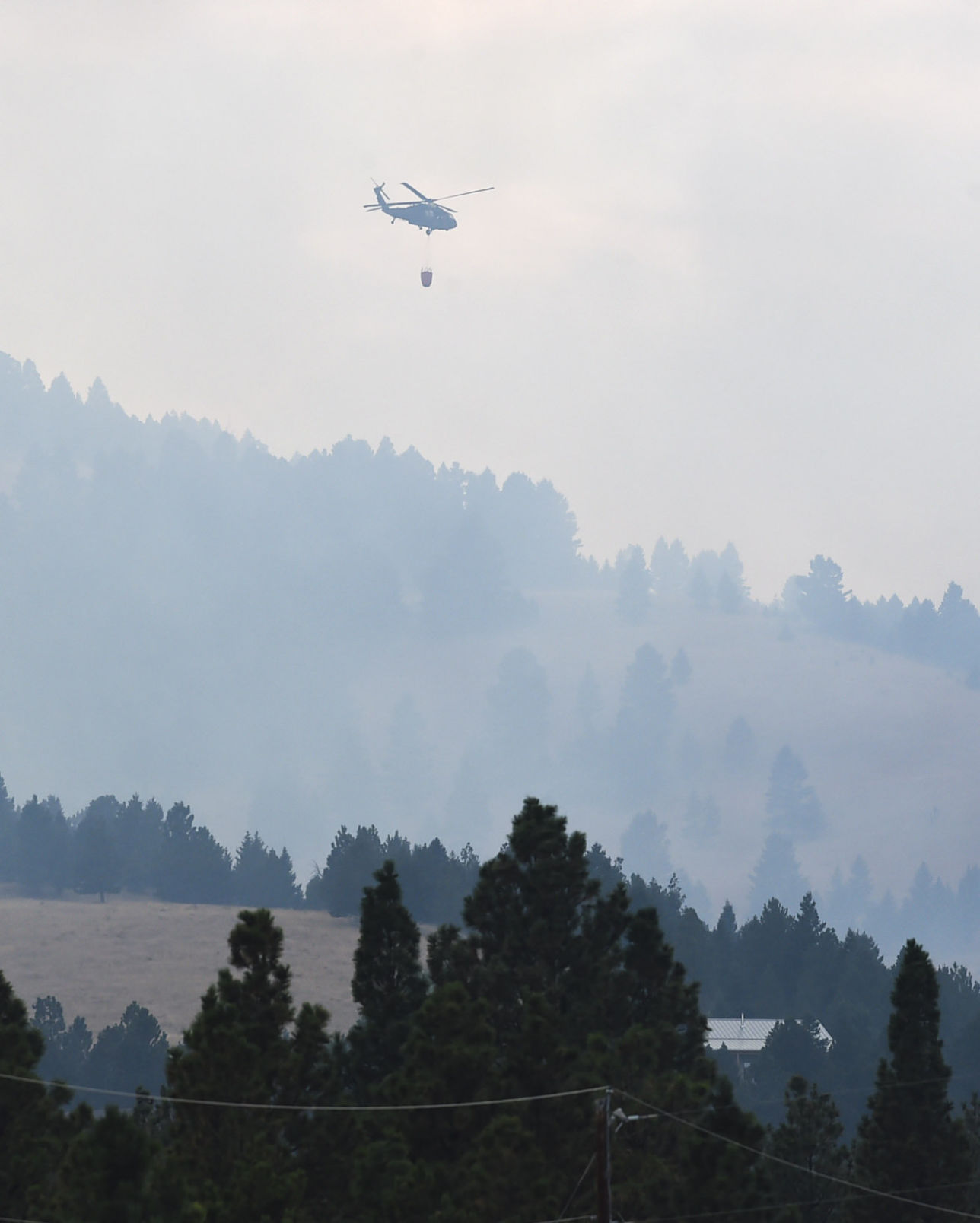 Roughly one hundred personnel and multiple aircraft help battle a lightening caused fire south of Helena Thursday afternoon.
